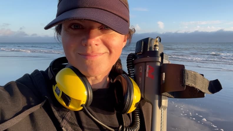 Laura Schoichet metal detecting on a Bay Area beach